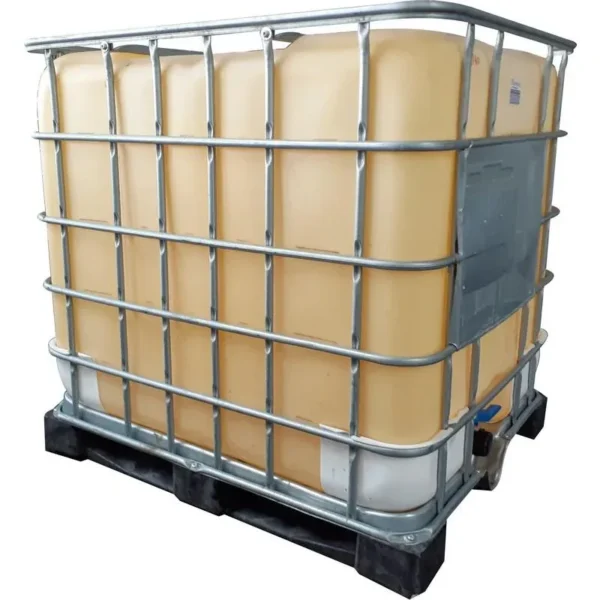Used 1000 L chemical-grade IBC tank C120 in a steel cage on a pallet